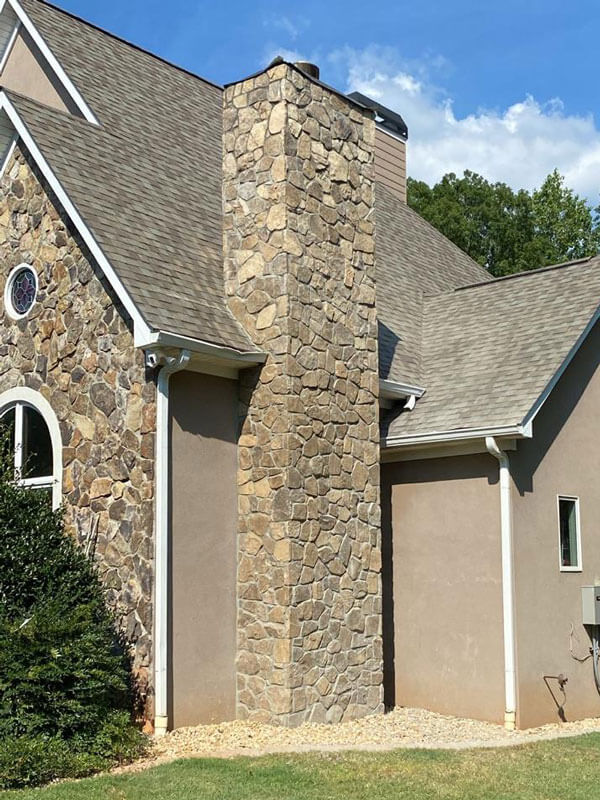 after chimney remodel with natural stone