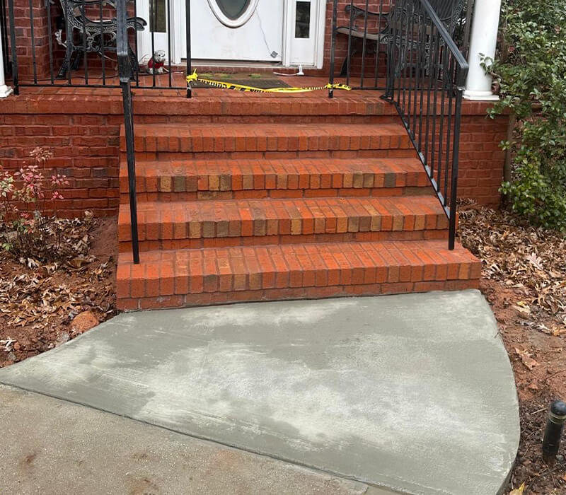 remodeled residential brick stairs and concrete sidewalk